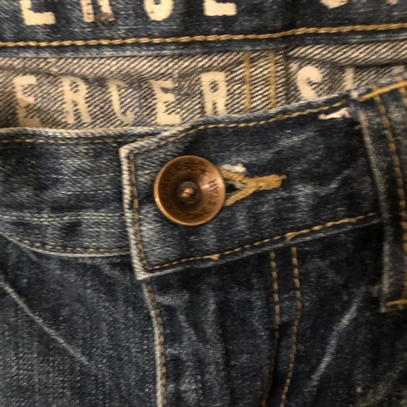 Distressed slim fit tapered jean - Picture 8 of 9